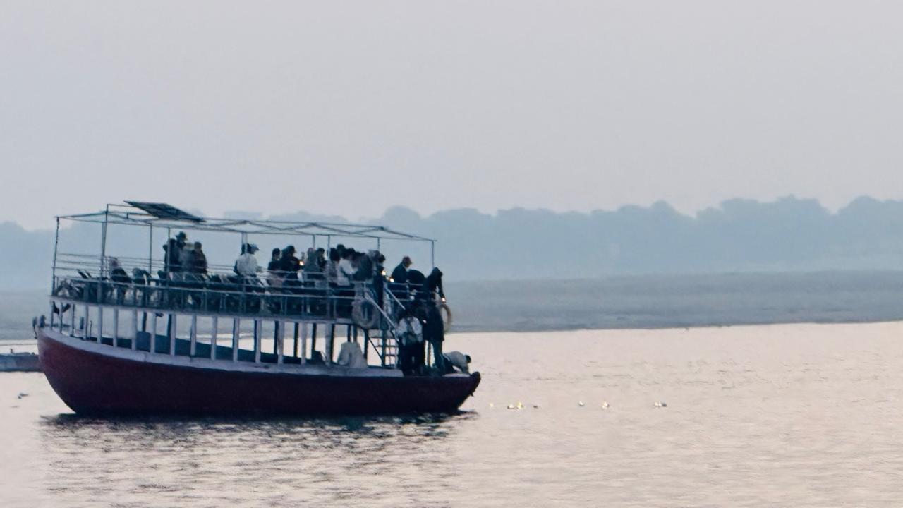 Boat passing Ramnagar Fort riverfront