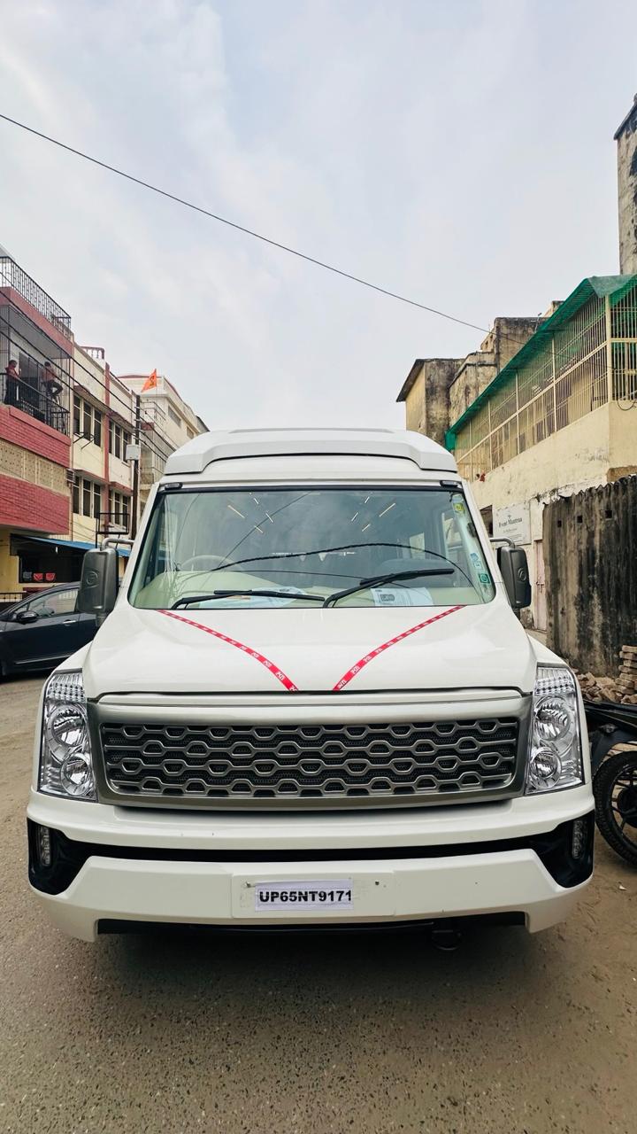 Fleet staged for departure Tempo traveller exterior before departure
