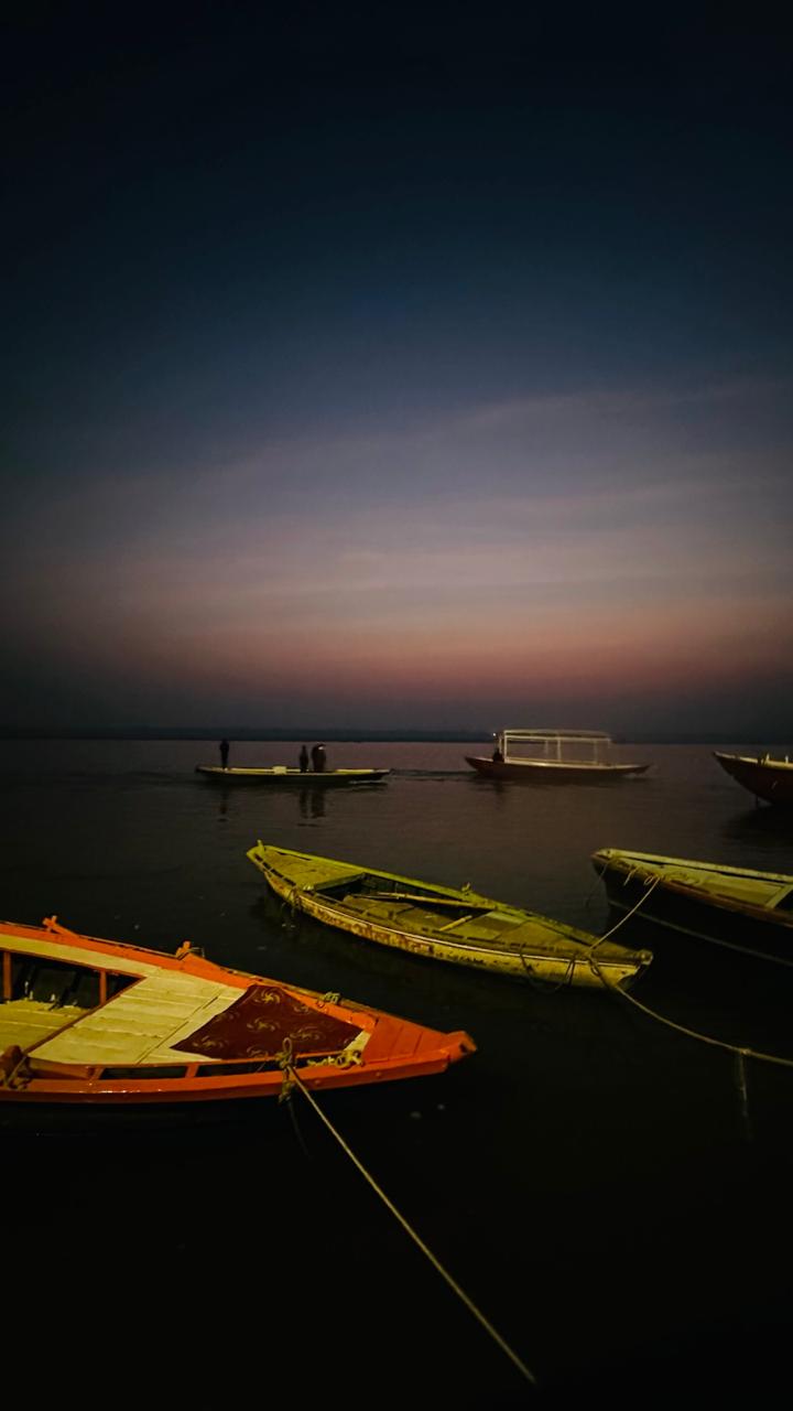 Magical night boat ride during Ganga Aarti Evening boat ride atmosphere